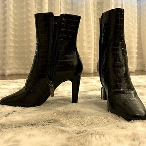 Yves St. Laurent ankle boots.